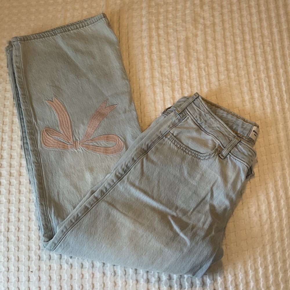 Abercrombie Kids~ low rise baggy light wash jeans with pink bows!! 🎀